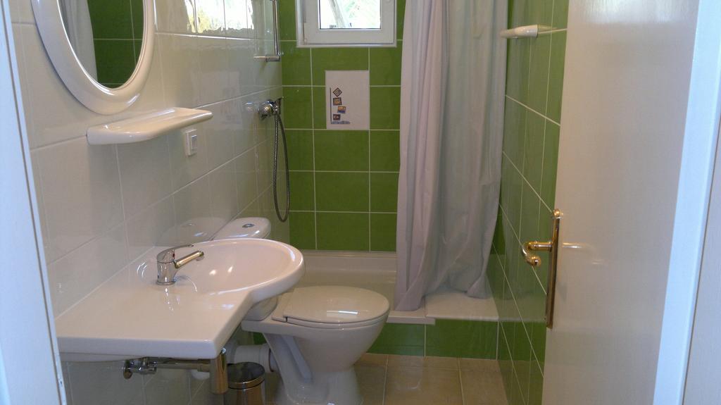 House Rozi Hotel Palit Room photo